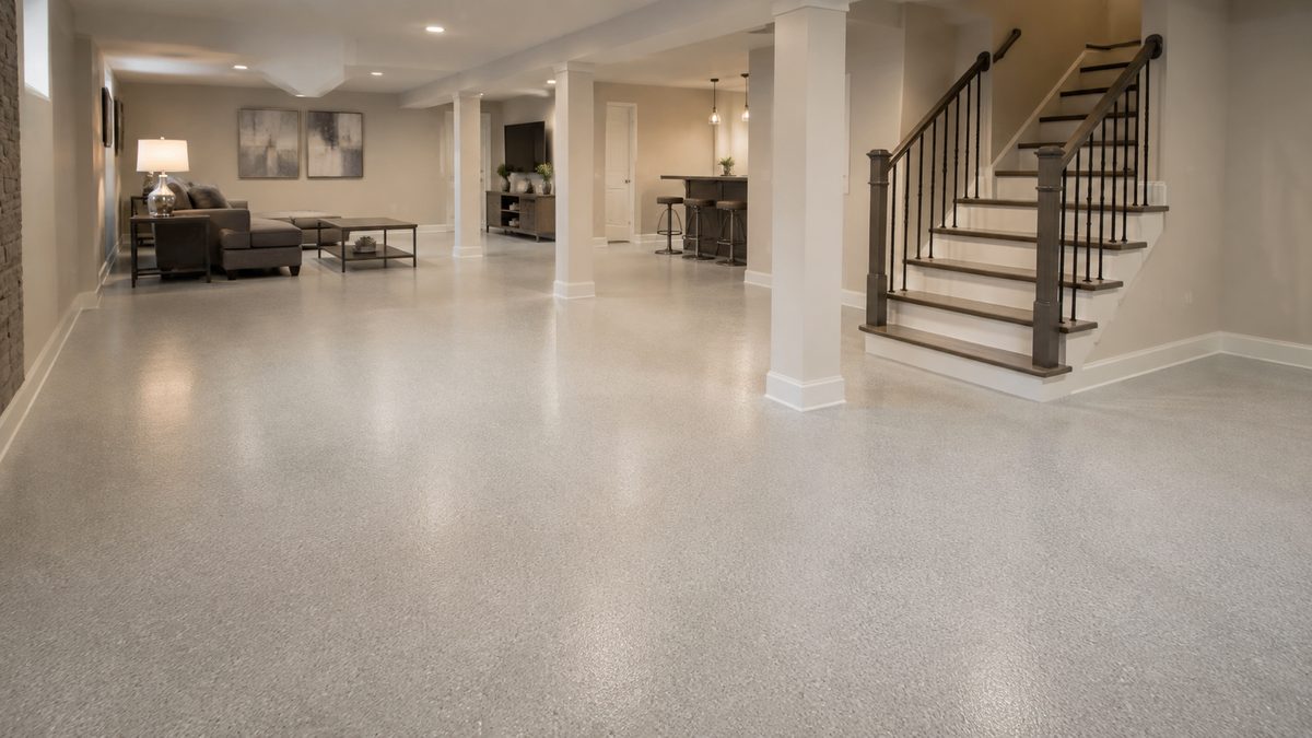 Light flake floor coating in a finished basement living area